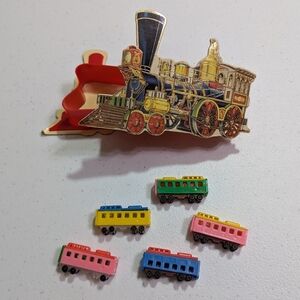 B. Shackman Train Container with plastic miniature train pieces